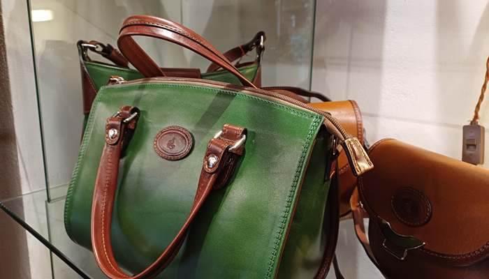 Handmade leather accessories crafted near Trevi Fountain