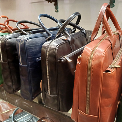 Classic black leather crossbody bag handcrafted in Italy