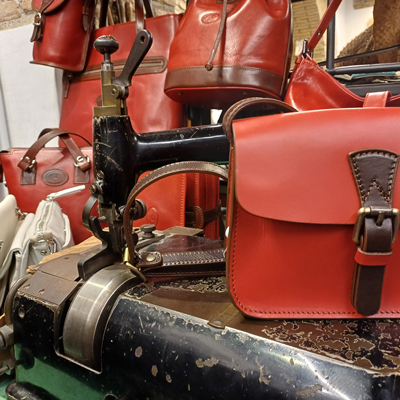 Luxury brown leather clutch purse from Leather Craftsman Rome