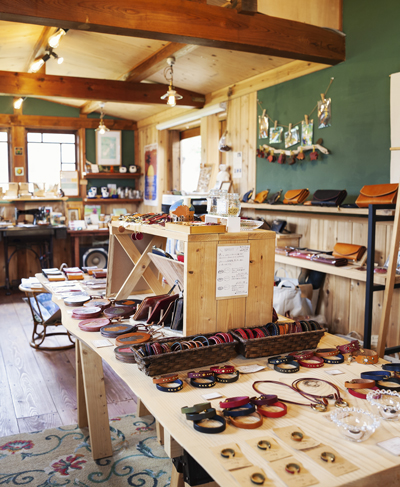 Hand-stitching leather goods in Rome